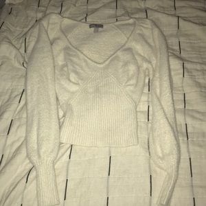 Fuzzy fitted v neck sweater